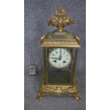 A 19th century french gilt bronze and alabaster mantle clock by Samuel Marti, Paris. It has a