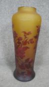 A Galle style amber and red cameo glass vase carved with blossom and leaves. Signed Galle. H.42cm