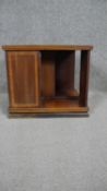 An Edwardian mahogany and satinwood inlaid revolving table top bookcase. h30 w36cm
