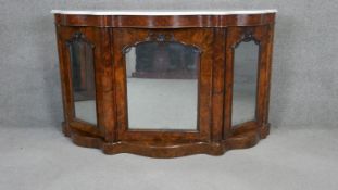 A Victorian burr walnut marble topped credenza with original plate glass doors. H.90 W.150cm