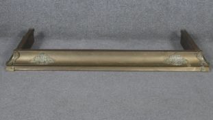 A C.1900 brass embossed fire kerb. W.100 H.9 D.39