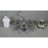 Three lamps. Including a vintage chrome UFO ceiling lamp, a plastic bull dog lamp and a ceramic