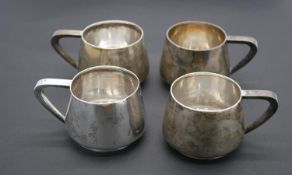 Four 19th century Russian silver handled cups by Aleksandr Timofeyevich Shevyakov. Hallmarked with