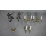 Three pairs of brass and copper wall lights and a single example. The copper lights with a