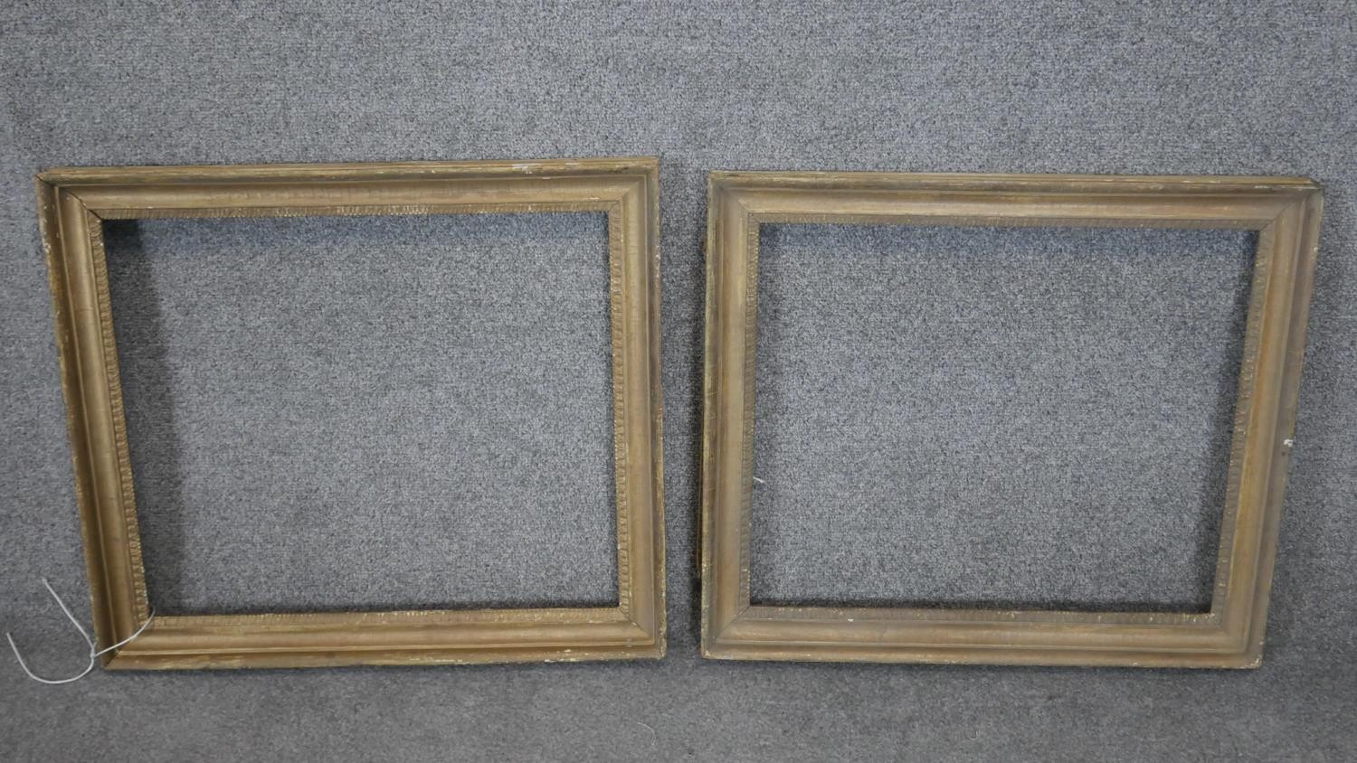 Two antique giltwood frames with acanthus leaf borders. Rebate, largest H.44 W.50 and H.43 W.50cm