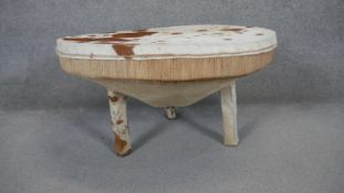 A tribal style drum/table with stretched cow hide top. H.45 Dia.84cm