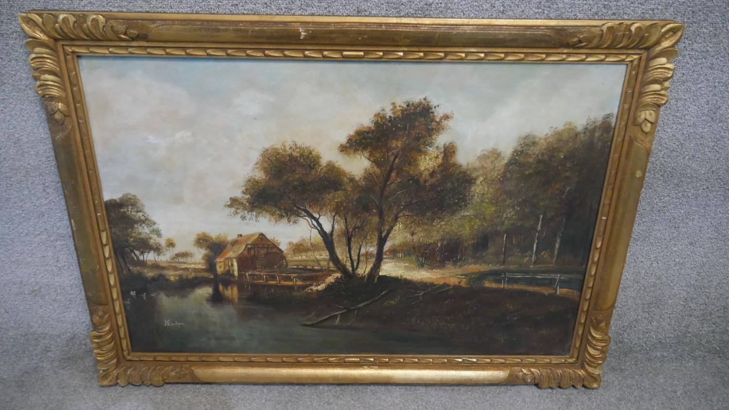 An oil on canvas, mill on a river, indistinctly signed in carved giltwood frame. H.74 W.103cm
