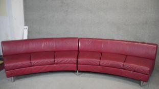 A two section leather upholstered arc sofa by Walter Knoll. H.75 W.340 D.80cm