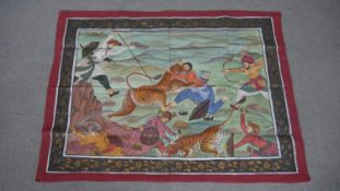 An Indo-Persian silk painted wall hanging depicting warriors and tigers in a landscape, all