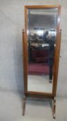 An Edwardian mahogany framed cheval mirror with bevelled plate. H.170cm