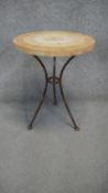 A small marble topped conservatory table on wrought iron base. H.52 Dia.40cm
