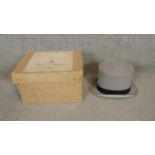 A vintage Herbert Johnson top hat and gloves in it's original box.