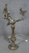 A Rococo style gilt bronze foliate design three branch table table lamp with shell form base. H.72CM