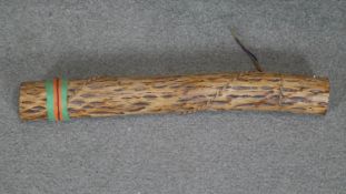 An Aboriginal cactus stalk rain stick. L.50CM