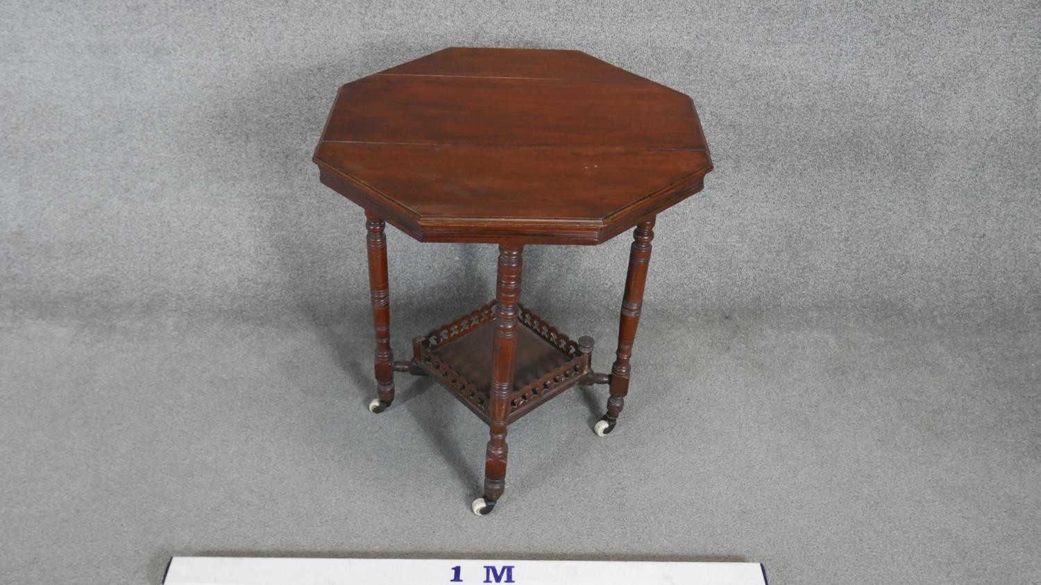 A 19th century mahogany occasional table on turned tapering supports united by galleried - Image 2 of 4