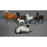 A collection of porcelain animals including five hand painted porcelain Beswick horses, makers stamp