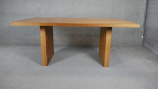 A contemporary hardwood planked top table on block supports. H.75 W.180 D.110cm (supports