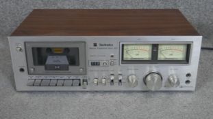 A teak and chrome design Technics stereo casette deck 631. H.15 W.43
