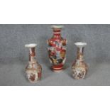 A collection of three early 20th century hand painted Japanese Satsuma ware ceramic vases, decorated