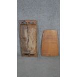 A large African hardwood twin handled tray along with an Aboriginal painted wooden panel with