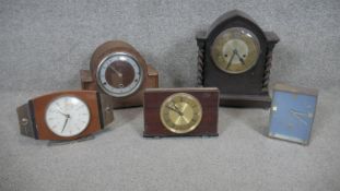 A miscellaneous collection of five vintage mantel clocks.
