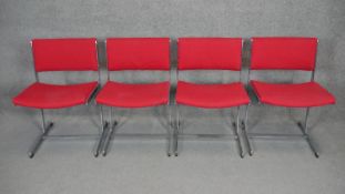 A set of four vintage chrome framed chairs.