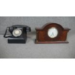 A vintage black bakelite telephone along with a Mappin & Webb Art Nouveau parquetry mahogany