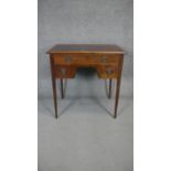An early 20th century Georgian style mahogany lowboy on tapering square supports. H.80 W.77 D.50cm