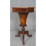 A Victorian walnut trumpet form work table with floral inlaid top and fitted interior. h72 d47
