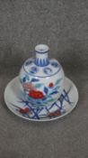 Two pieces of hand painted Japanese Arita ware. The vase decorated with peonies and medallions and