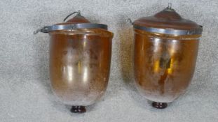 A pair of amber blown glass Hundi bell jar pendant lights. H.36CM