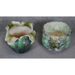 Two majolica ceramic foliate design cachepots. One with relief frog design with TS impressed into