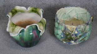 Two majolica ceramic foliate design cachepots. One with relief frog design with TS impressed into