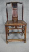 A Chinese hardwood side chair with panel seat on shaped, carved and stretchered supports.