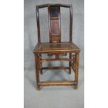 A Chinese hardwood side chair with panel seat on shaped, carved and stretchered supports.
