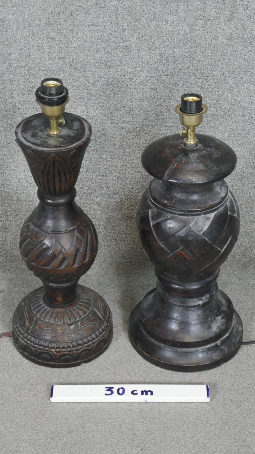 Two carved and stained table lamps with geometric design.H.60CM - Image 2 of 4