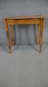 A 19th century pine bow fronted side table. H.73 W.76 D.45cm