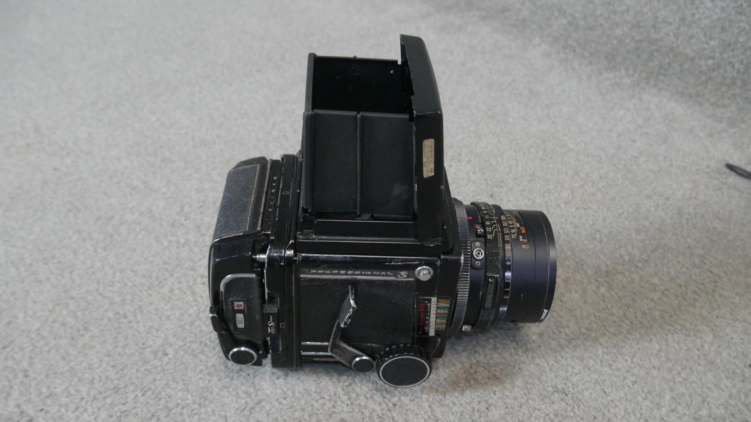 A Mamiya RB67 camera with metered prisms, lenses and film backs with brown leather carrying case. - Image 3 of 5