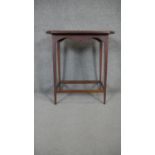 An Edwardian mahogany occasional table inlaid with satinwood fan patera. H.70 W.60 D.40cm