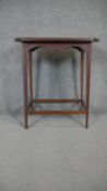 An Edwardian mahogany occasional table inlaid with satinwood fan patera. H.70 W.60 D.40cm