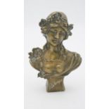 An Art Nouveau style brass bust of a maiden titled 'Le Printemps'.