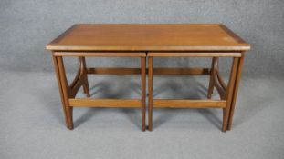 A nest of three 1970's vintage teak occasional tables. H.52 W.100 D.50cm