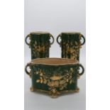 A pair of green ceramic vintage twin handled vases with gilded foliate and song bird design along