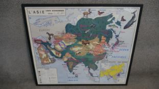 A framed and glazed vintage French teaching map of Asia with animal illustrations. H.84 W.94