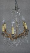 A vintage brass and blown twisted glass six branch chandelier with crystal drops and swags. H.67cm