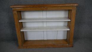 A 19th century pine open bookcase on plinth base. H.89 W.122 D.27cm