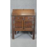 A mid century oak antique style fall front bureau with fitted interior. h93 w68 d40