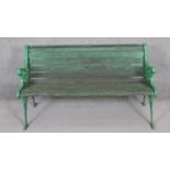 A vintage painted iron garden bench with slatted seat. H.73 x W.127 x D.60cm