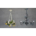 Two Italian toleware floral and foliate design chandeliers. One with yellow buttercups and the other