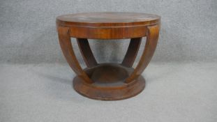 An Art Deco burr walnut lamp table on shaped supports resting on a stepped base. H.46 D.64CM